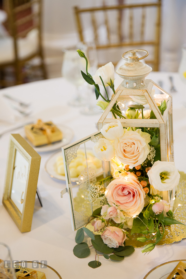 Kent Island Maryland wedding dining table centerpiece with rose and lantern by Cache Fleur photo by Leo Dj Photography