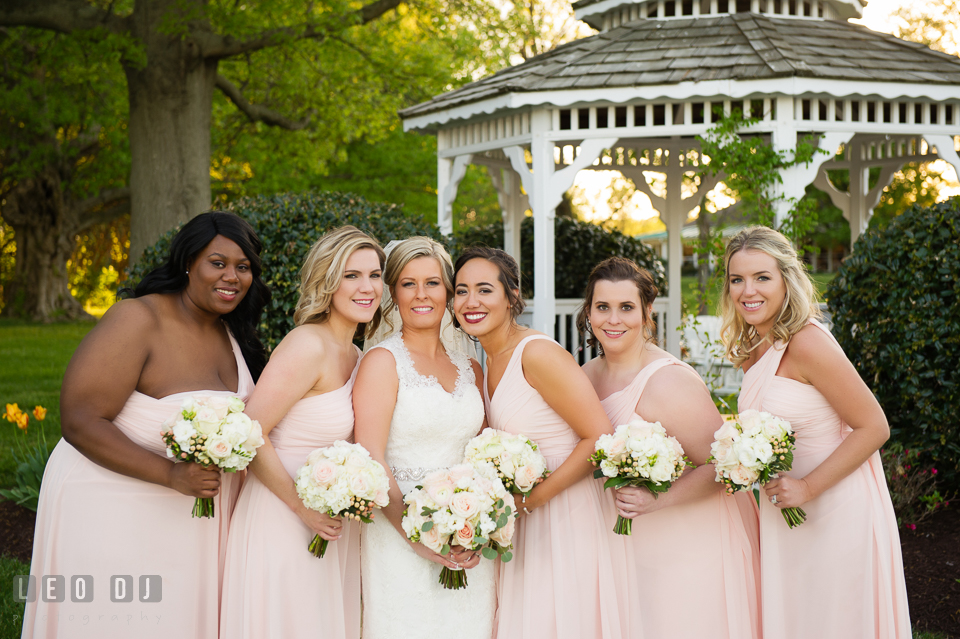 Kent Manor Inn Bride, Maid of Honor, and Bridesmaids posing by the gazebo photo by Leo Dj Photography