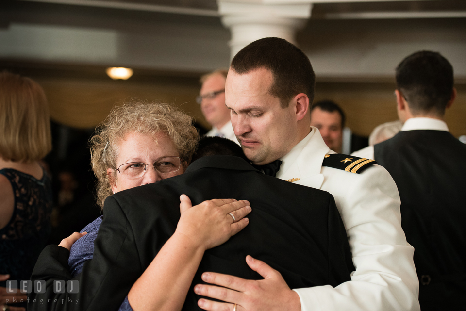 Eastern Shore Maryland mother of groom hugging son at wedding reception photo by Leo Dj Photography