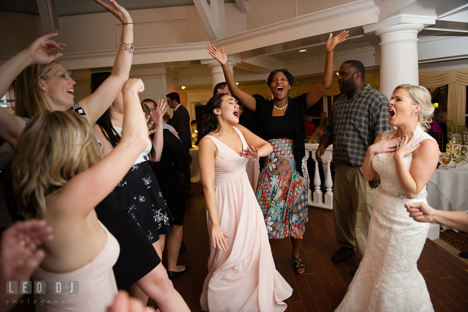 Kent Island Maryland Bride and guests dancing and singing with music from Crow Entertainment DJ at wedding reception photo by Leo Dj Photography