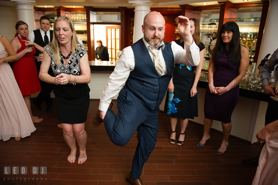 Kent Island Maryland guest dance holding his leg at wedding reception photo by Leo Dj Photography