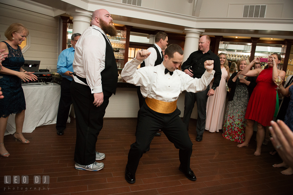 Eastern Shore Maryland Groom dancing to music by Crow Entertainment DJ at wedding reception photo by Leo Dj Photography