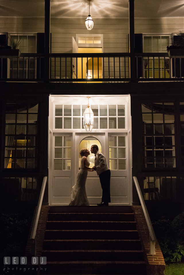 Kent Manor Inn evening shot of Bride and Groom silhouette in back of the hotel photo by Leo Dj Photography