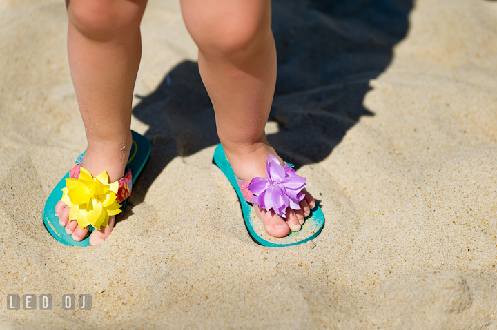 Little girls wearing cute flip flops. Ocean City, Maryland Eastern Shore candid children and family lifestyle photo session by photographers of Leo Dj Photography. http://leodjphoto.com