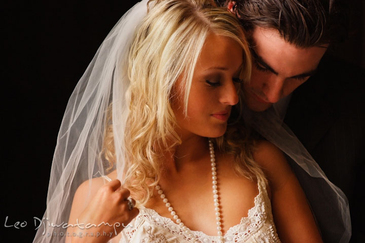 Bride and groom cuddling together and smile. Wedding bridal portrait photo workshop with Cliff Mautner. Images by Leo Dj Photography