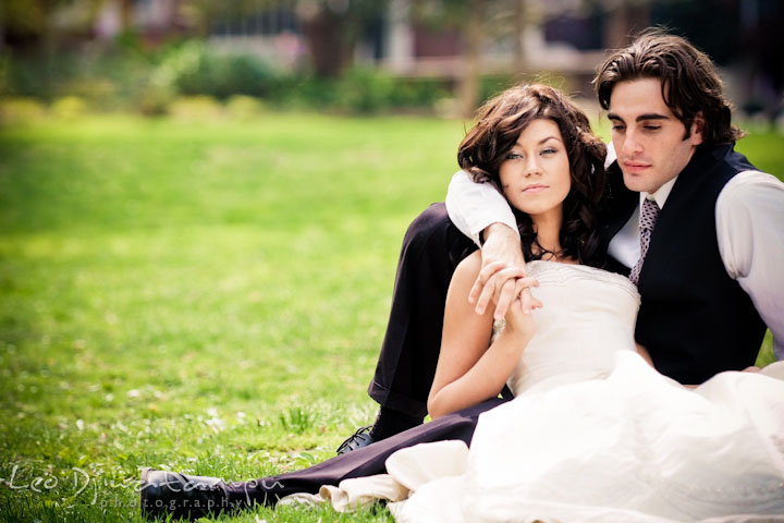 Bride and groom sitting on the ground cuddling together. Wedding bridal portrait photo workshop with Cliff Mautner. Images by Leo Dj Photography