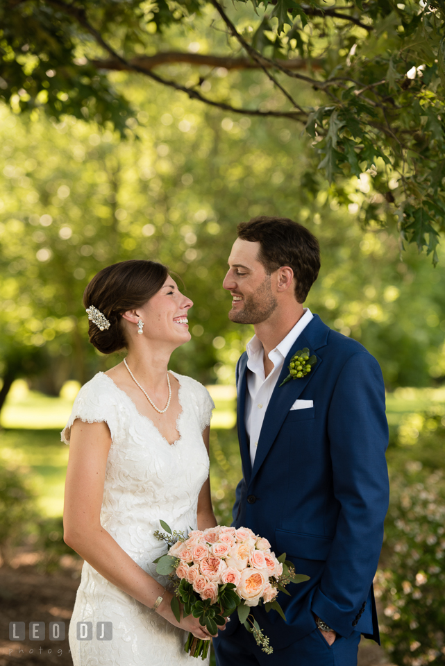 Bride and Groom standing close smiling to each other. The Oaks Waterfront Inn wedding, St Michaels, Eastern Shore, Maryland, by wedding photographers of Leo Dj Photography. http://leodjphoto.com