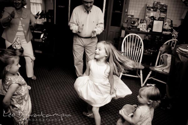 girl and family dancing. Children family reunion birthday photography Tilghman Island Annapolis Kent Island Eastern Shore MD