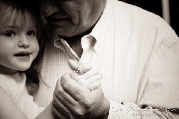 girl dancing with grandpa grandfather. Children family reunion birthday photography Tilghman Island Annapolis Kent Island Eastern Shore MD