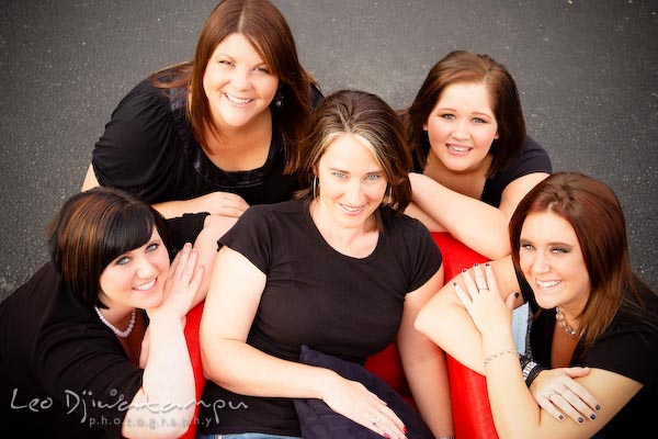 Five ladies posing on/by chair, looking up. Commercial work photography Annapolis Eastern Shore MD Washington DC