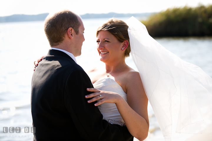 Bride and Groom on the beach looking at each other. Getting ready and ceremony wedding photos at private estate at Preston, Easton, Eastern Shore, Maryland by photographers of Leo Dj Photography. http://leodjphoto.com