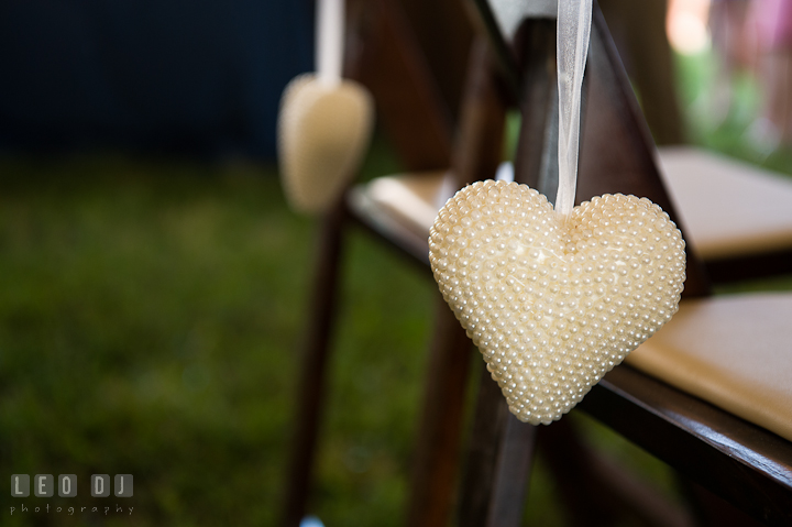 Heart decorations hanging on Bride and Groom's chairs. Getting ready and ceremony wedding photos at private estate at Preston, Easton, Eastern Shore, Maryland by photographers of Leo Dj Photography. http://leodjphoto.com