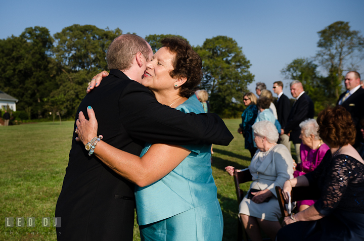 Mother of the Groom hugging son. Getting ready and ceremony wedding photos at private estate at Preston, Easton, Eastern Shore, Maryland by photographers of Leo Dj Photography. http://leodjphoto.com