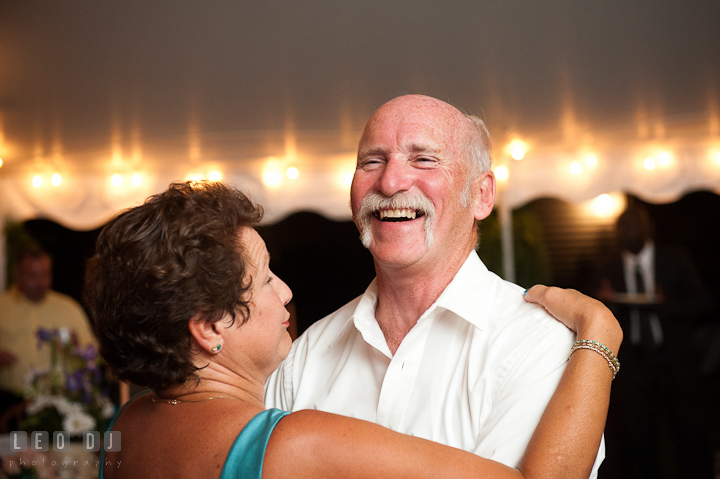 Father and Mother of Groom dancing and laughing. Reception party wedding photos at private estate at Preston, Easton, Eastern Shore, Maryland by photographers of Leo Dj Photography. http://leodjphoto.com