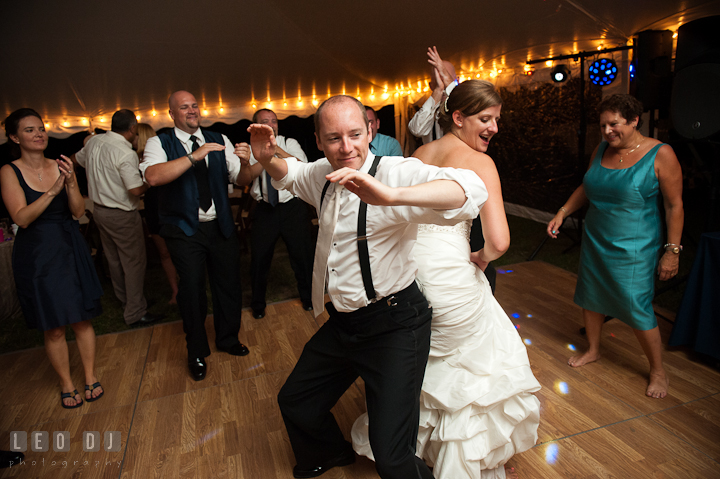 Bride and Groom dancing and rubbing their buttocks. Reception party wedding photos at private estate at Preston, Easton, Eastern Shore, Maryland by photographers of Leo Dj Photography. http://leodjphoto.com