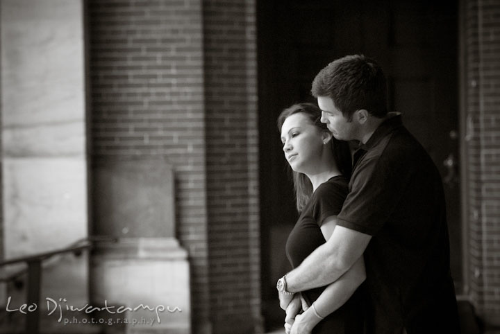 Engaged girl hugged by her fiancé. Tremont Plaza Hotel and Grand Historic Venue Baltimore Pre-wedding Engagement Photo Session by wedding photographers Leo Dj Photography