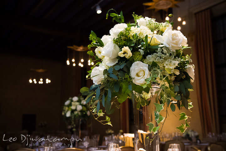 White rose floral arrangement table centerpiece. Baltimore Maryland Tremont Plaza Hotel Grand Historic Venue wedding ceremony and reception photos, by photographers of Leo Dj Photography.