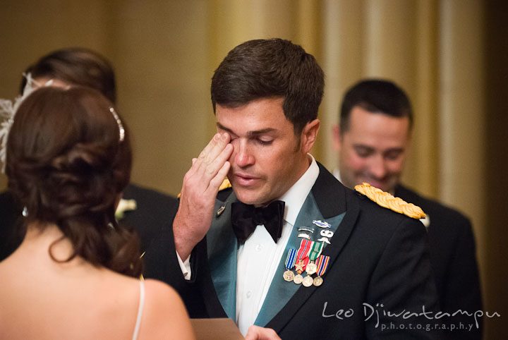 Groom wiped off tear as he was reading the vow. Baltimore Maryland Tremont Plaza Hotel Grand Historic Venue wedding ceremony and reception photos, by photographers of Leo Dj Photography.