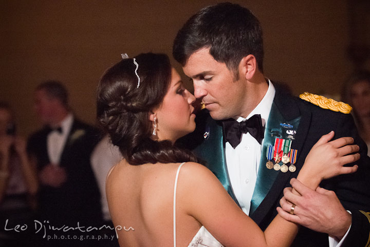 Bride and Groom looking at each other passionately during first dance. Baltimore Maryland Tremont Plaza Hotel Grand Historic Venue wedding ceremony and reception photos, by photographers of Leo Dj Photography.