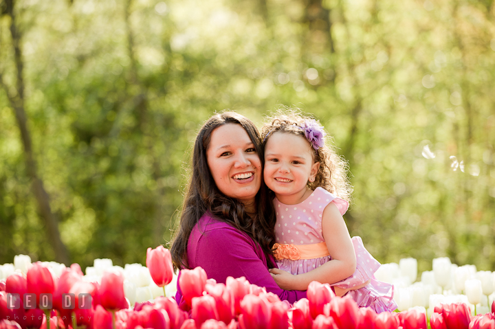 Mother and girl smiling. Washington DC, Silver Spring, Maryland candid children and family lifestyle photo session by photographers of Leo Dj Photography.