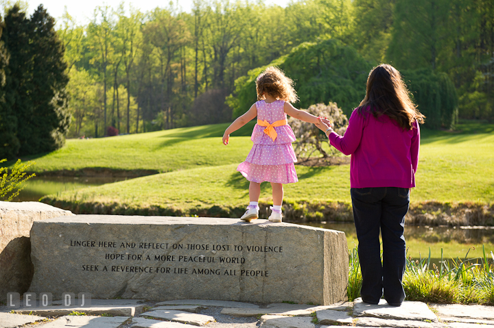 Mom and little girl enjoying the scenery. Washington DC, Silver Spring, Maryland candid children and family lifestyle photo session by photographers of Leo Dj Photography.