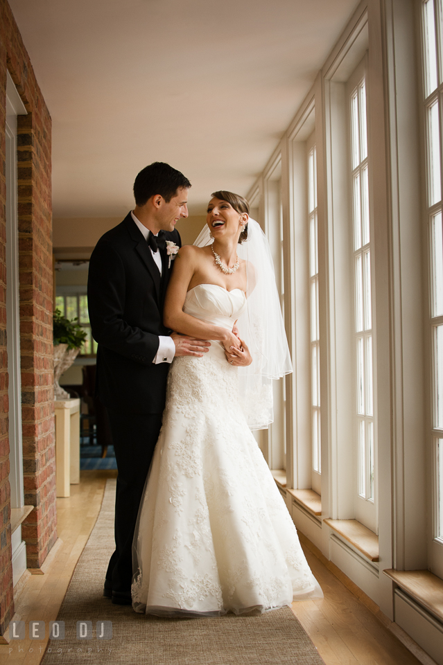 Bride and Groom laughing. Aspen Wye River Conference Centers wedding at Queenstown Maryland, by wedding photographers of Leo Dj Photography. http://leodjphoto.com