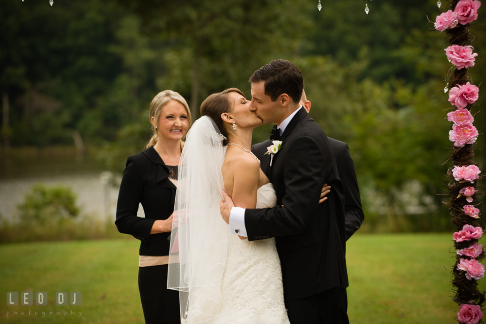 Bride and Groom kissing after the wedding ceremony. Aspen Wye River Conference Centers wedding at Queenstown Maryland, by wedding photographers of Leo Dj Photography. http://leodjphoto.com