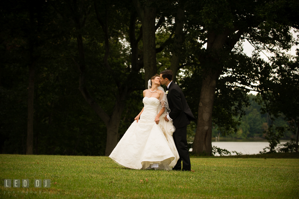 Bride and Groom kissing during romantic photo session. Aspen Wye River Conference Centers wedding at Queenstown Maryland, by wedding photographers of Leo Dj Photography. http://leodjphoto.com