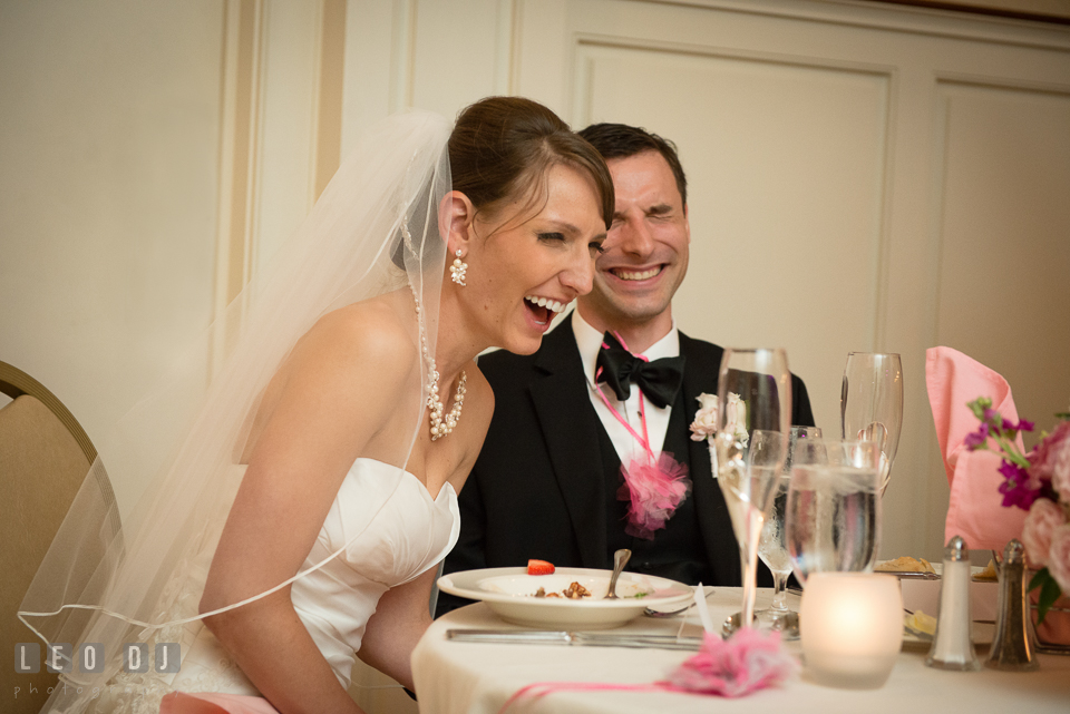 Bride and Groom laughing listening to toast speech. Aspen Wye River Conference Centers wedding at Queenstown Maryland, by wedding photographers of Leo Dj Photography. http://leodjphoto.com