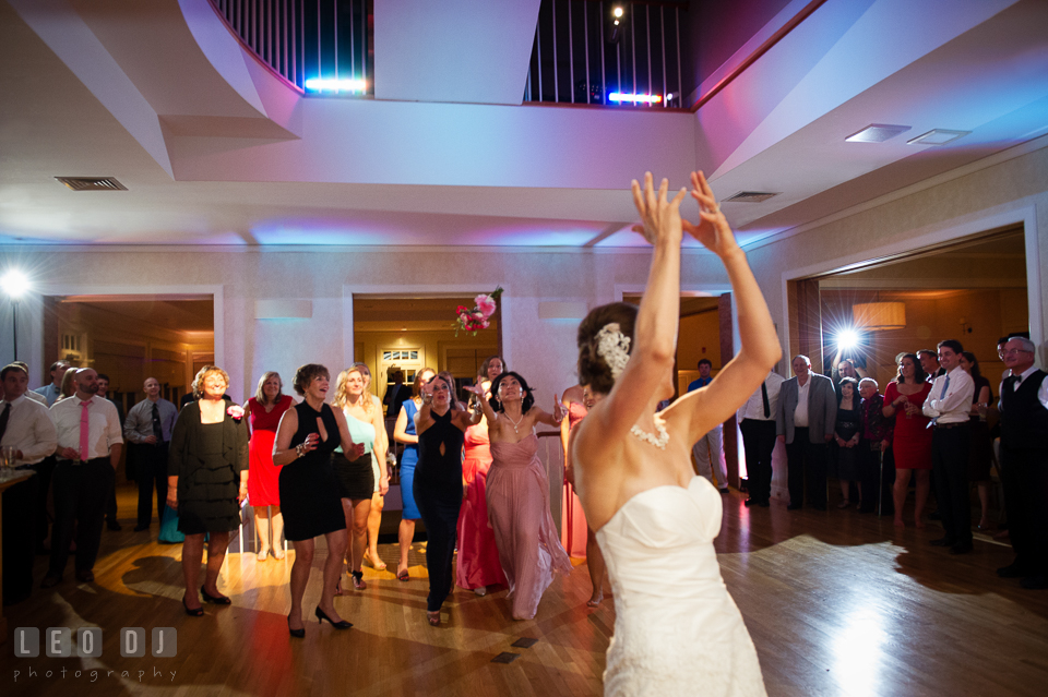 Female guests trying to grab wedding bouquet. Aspen Wye River Conference Centers wedding at Queenstown Maryland, by wedding photographers of Leo Dj Photography. http://leodjphoto.com