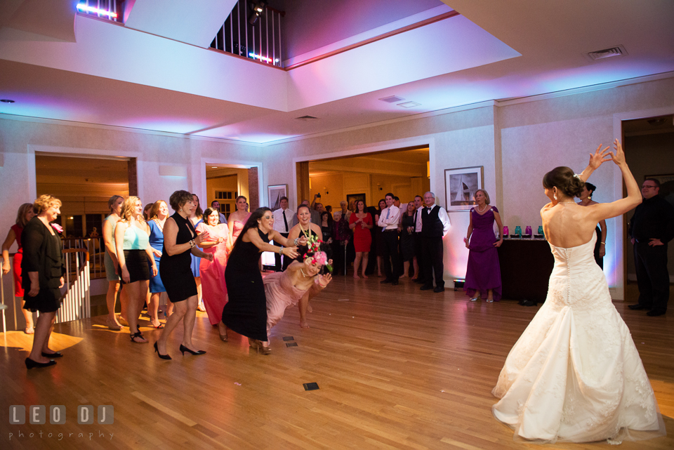 Two girls grabbed hold of the wedding bouquet and fell. Aspen Wye River Conference Centers wedding at Queenstown Maryland, by wedding photographers of Leo Dj Photography. http://leodjphoto.com