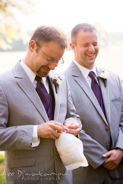 Best man and groomsman laughing. Mariott Aspen Wye River Conference Center Wedding photos at Queenstown Eastern Shore Maryland, by photographers of Leo Dj Photography.
