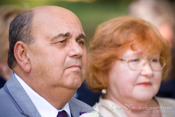 Father and mother of bride watching the ceremony. Mariott Aspen Wye River Conference Center Wedding photos at Queenstown Eastern Shore Maryland, by photographers of Leo Dj Photography.