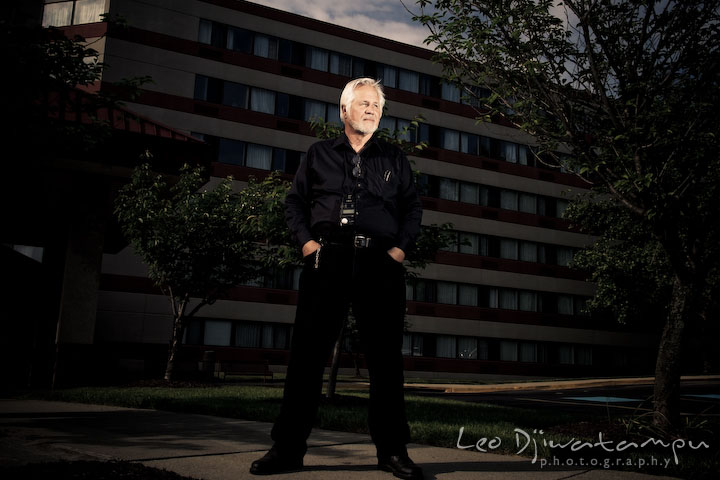 Don's portrait in front of a hotel. Lighting Essentials Workshops - Baltimore with Don Giannatti