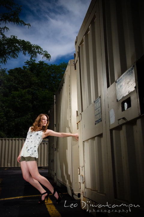 Girl model holding trailer storage containers. Lighting Essentials Workshops - Baltimore with Don Giannatti