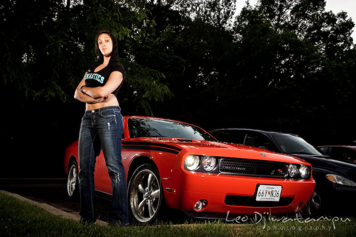 Girl model posing with an orange Dodge Challenger sport car for a hip-hop theme for a magazine spread. Lighting Essentials Workshops - Baltimore with Don Giannatti