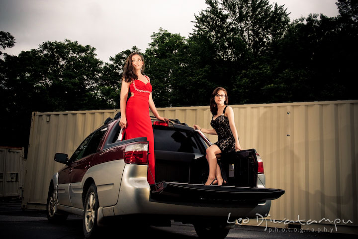 Two beautiful model girls posing on a pickup truck. Lighting Essentials Workshops - Baltimore with Don Giannatti