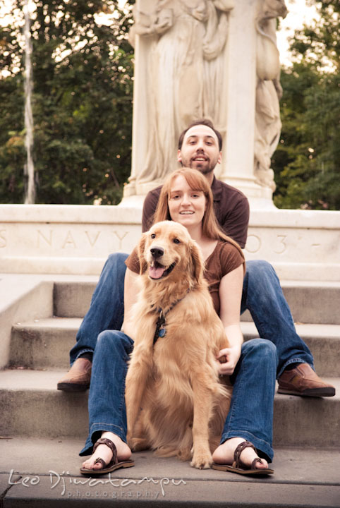 Engaged girl posing with her dog and fiancé. Dupont Circle Washington DC pre-wedding engagement session by Leo Dj Photography