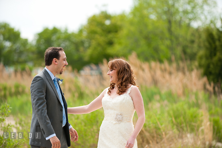 Bride and Groom see each other for the first time. Harbourtowne Golf Resort wedding photos at St. Michaels, Eastern Shore, Maryland by photographers of Leo Dj Photography.