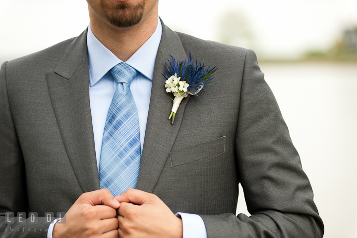 Groom's jacket with boutonnierre. Harbourtowne Golf Resort wedding photos at St. Michaels, Eastern Shore, Maryland by photographers of Leo Dj Photography.