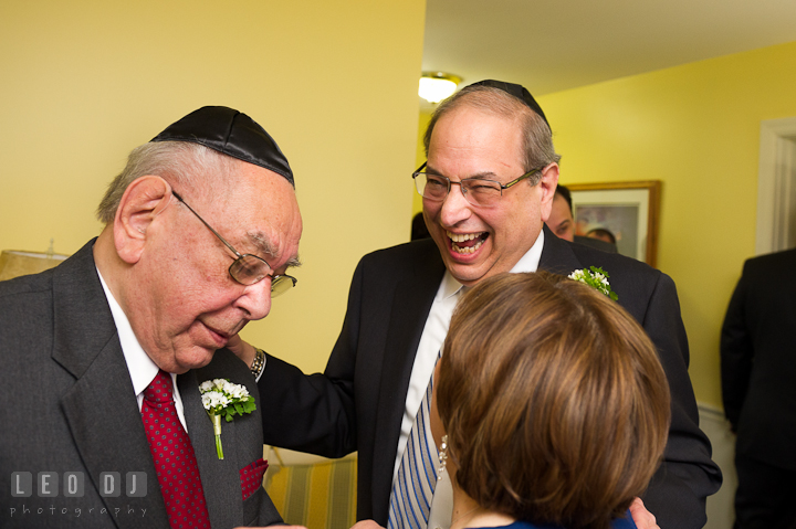 Father and grandfather of the groom laughing. Harbourtowne Golf Resort wedding photos at St. Michaels, Eastern Shore, Maryland by photographers of Leo Dj Photography.