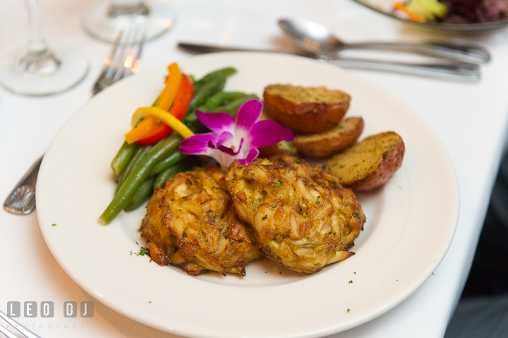 Crabcake dinner with potatoes, green bean, and carrot slices. Harbourtowne Golf Resort wedding photos at St. Michaels, Eastern Shore, Maryland by photographers of Leo Dj Photography.