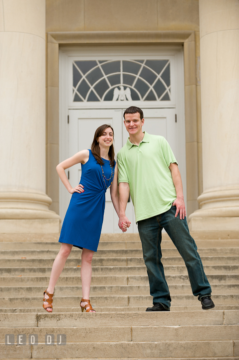 Engaged couple touching shoulders. Pre-wedding or engagement photo session at University of Maryland at College Park campus by wedding photographers of Leo Dj Photography.