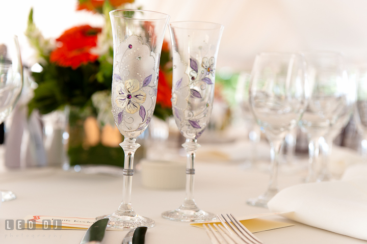 Custom made champagne glasses with floral decorations. Historic London Town and Gardens wedding photos at Edgewater Annapolis, Maryland by photographers of Leo Dj Photography. http://leodjphoto.com