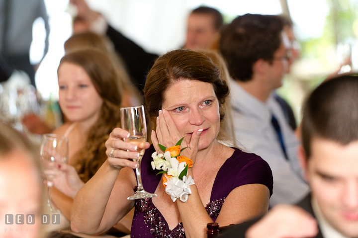 Mother of Groom shed tear listening to Father of Bride's speech. Historic London Town and Gardens wedding photos at Edgewater Annapolis, Maryland by photographers of Leo Dj Photography. http://leodjphoto.com