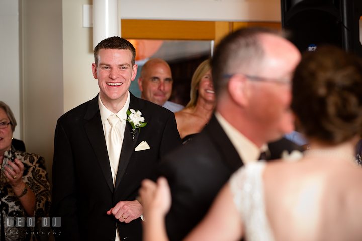 Groom laughing seeing the Father Daughter dance. Historic London Town and Gardens wedding photos at Edgewater Annapolis, Maryland by photographers of Leo Dj Photography. http://leodjphoto.com