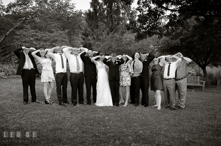 Bride and her siblings and cousins making goggles with their hands. Historic London Town and Gardens wedding photos at Edgewater Annapolis, Maryland by photographers of Leo Dj Photography. http://leodjphoto.com