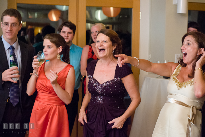 Mother of Groom and guests laughing. Historic London Town and Gardens wedding photos at Edgewater Annapolis, Maryland by photographers of Leo Dj Photography. http://leodjphoto.com