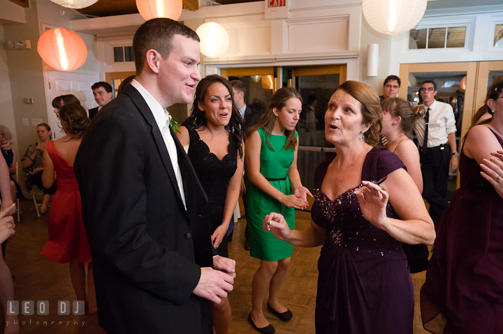 Mother and Groom singing together. Historic London Town and Gardens wedding photos at Edgewater Annapolis, Maryland by photographers of Leo Dj Photography. http://leodjphoto.com