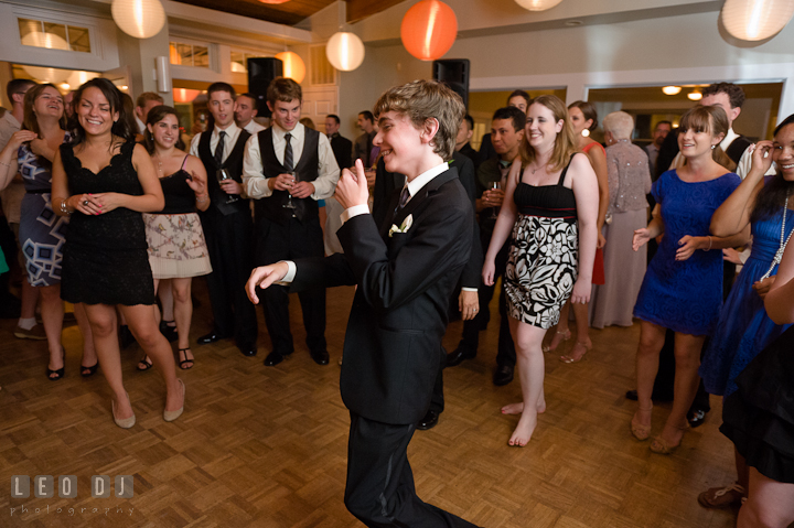 Brother of Bride dancing and laughing. Historic London Town and Gardens wedding photos at Edgewater Annapolis, Maryland by photographers of Leo Dj Photography. http://leodjphoto.com